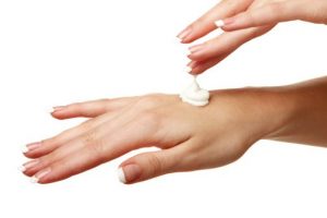 tea based sunscreen on skin of hand
